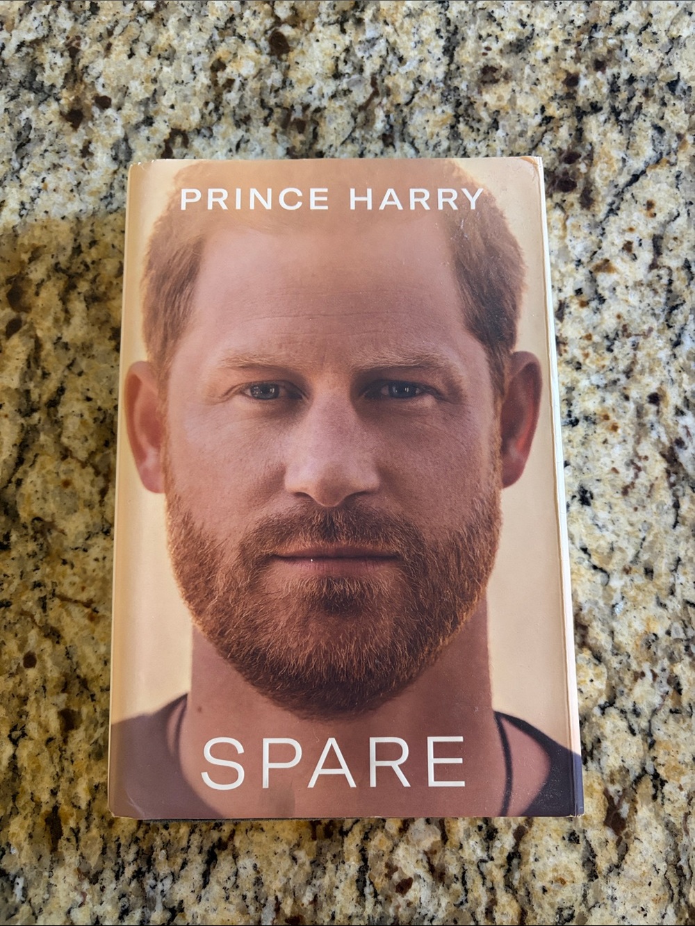 Spare - Hardcover Memoir in Tan/Brown Cover